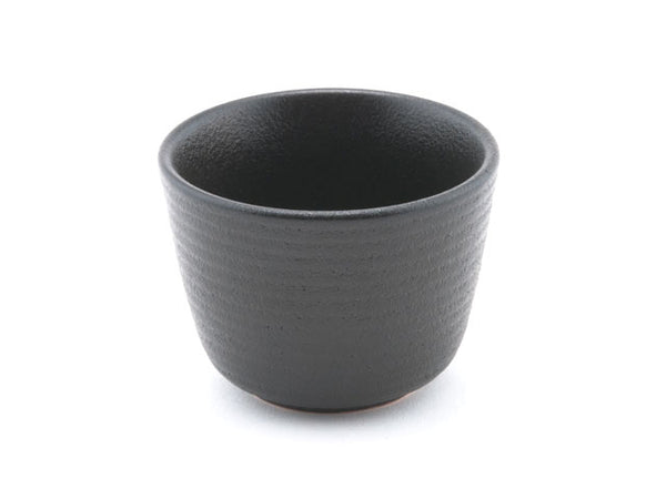 Ripple textured ceramic tea cup