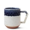 blue glaze on white mug
