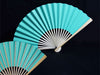 Pretty turquoise paper folding fan