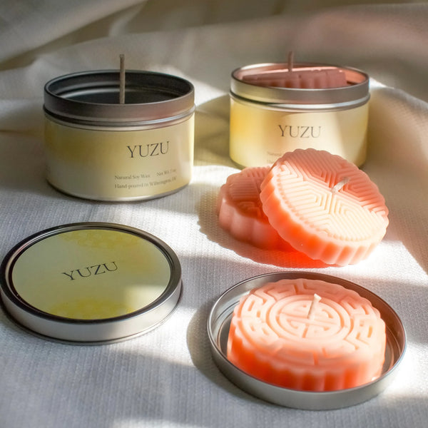 Yuzu mooncake-shaped candles with tins