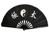 Black fan with yin yang symbol and tai chi characters