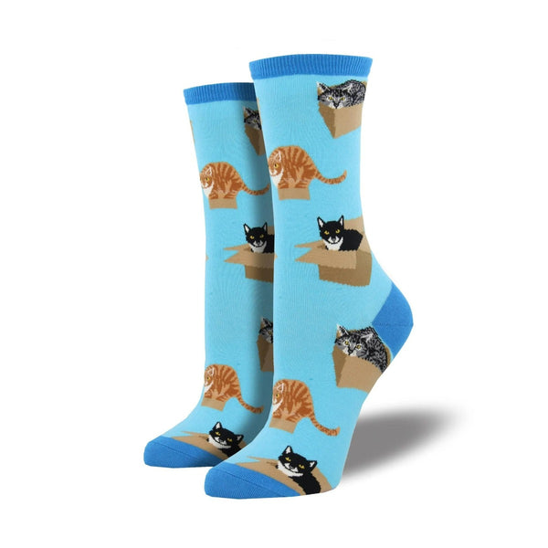 Cat in a Box Novelty Socks: Several cats of different colors in boxes on a bright blue sock