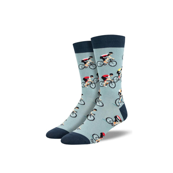 Light blue socks with dark blue accents, featuring cyclists repeating as the pattern