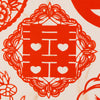 Red paper cut decoration with Chinese double happiness character with hearts