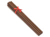 wooden chopsticks tied with a red ribbon 