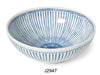 A modern white bowl with thin minimalistic blue lines
