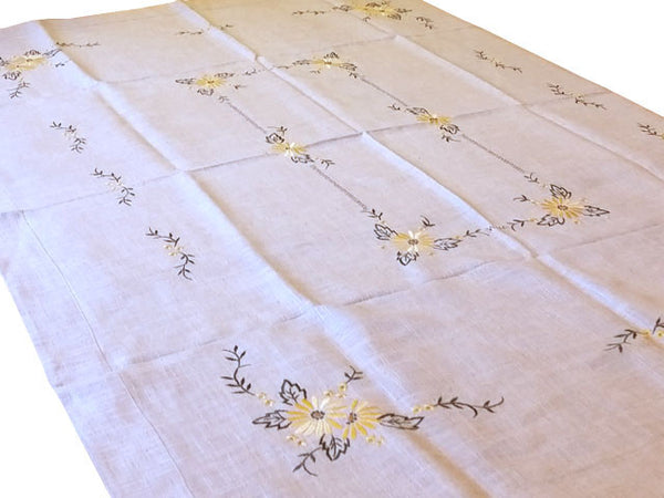 embroidered linen table cloth with floral design
