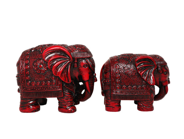 Red lacquer elephant figurines