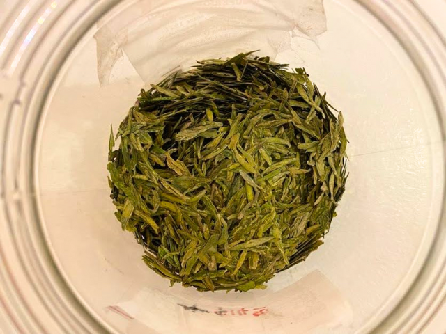 Long Jing Pre-Qingming Organic Green Tea in a jar