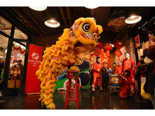 Lion dancer on stool with musicians in front of Pearl River Mart Foods