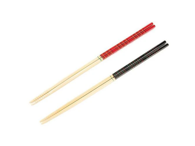 Two pairs of chopsticks, one red and one black