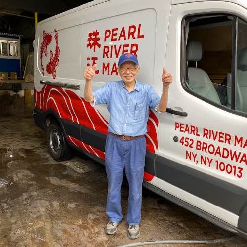 Pearl River Mart owner Mr. Chen with the Pearl River Mart van