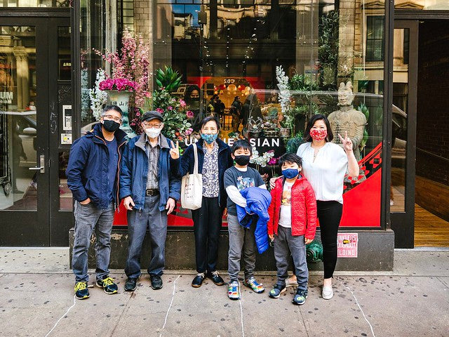 Chen family in front of SoHo Pearl River