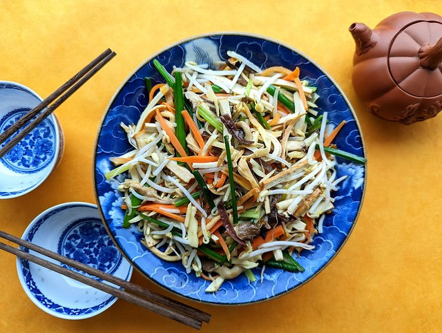 Mrs. Chen's 10 veggie delight in bright blue dish
