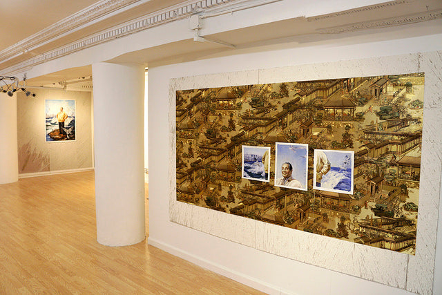 Ben Sloat's exhibition at Pearl River Mart Tribeca gallery of gold wall paper with illustrations of Deng Xiao Ping
