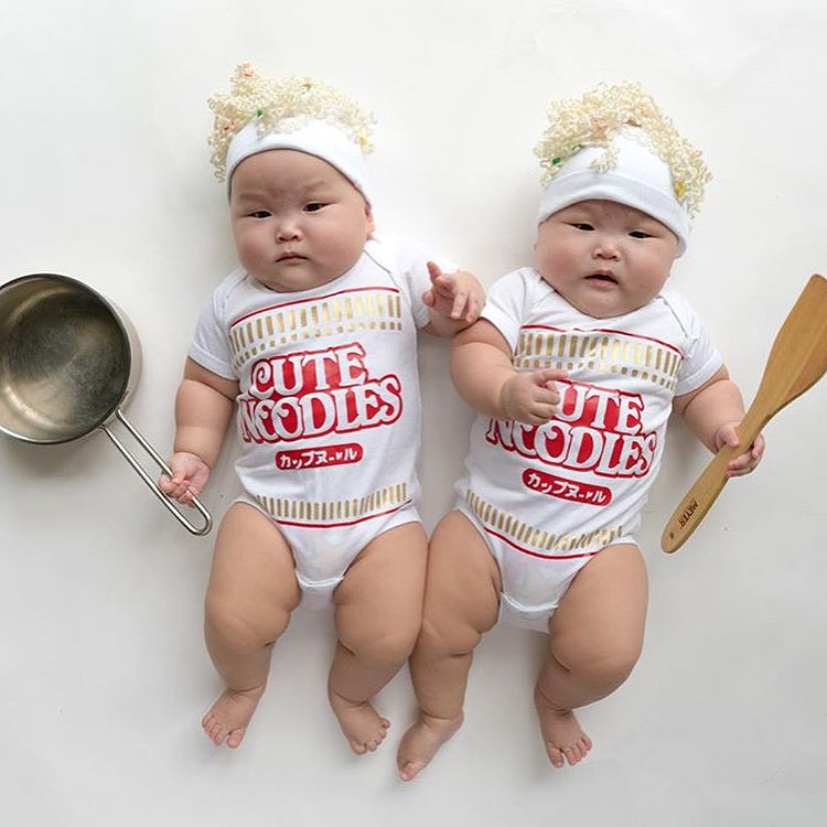 Adorable chubby babies in Cute Noodles onesies