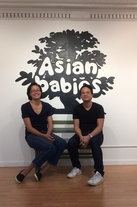 Amy Hwang and Jeremy Nguyen in front of Asian Babies mural