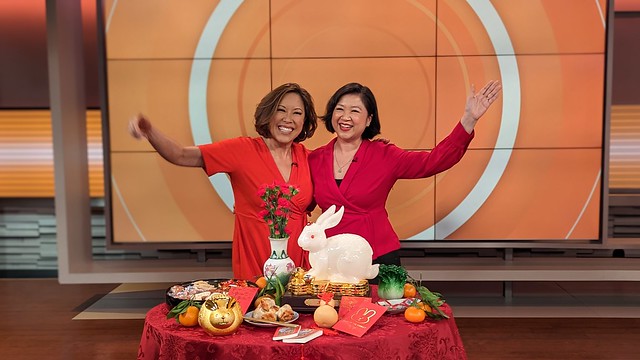 Cindy Hsu and Joanne Kwong with Lunar New Year table at CBS studios