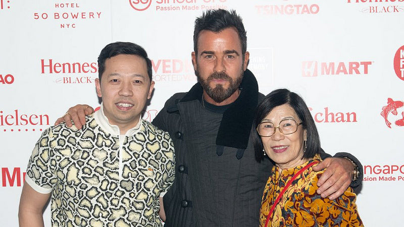 Actor Justin Theroux with Opening Ceremony founder Humberto Leon and his mother