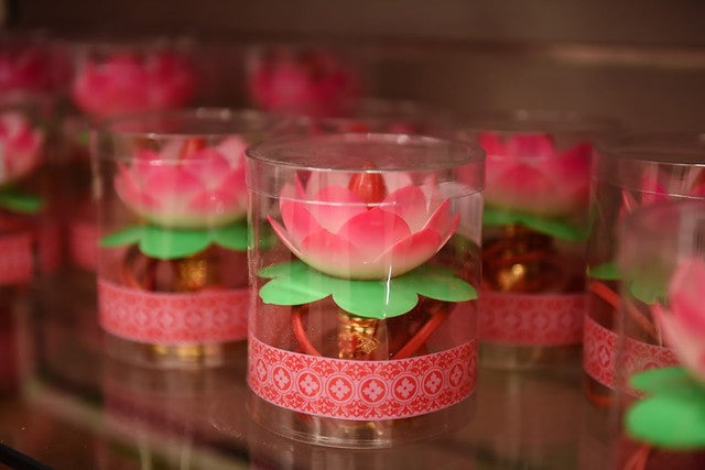 Pink lotus flower lamps on store shelf