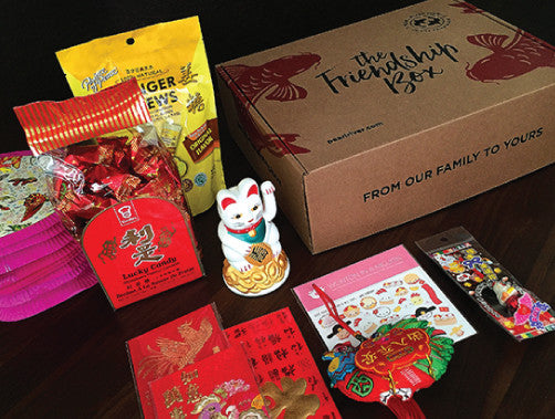 Chinese candy, lucky cat, red envelopes, stickers, Friendship Box