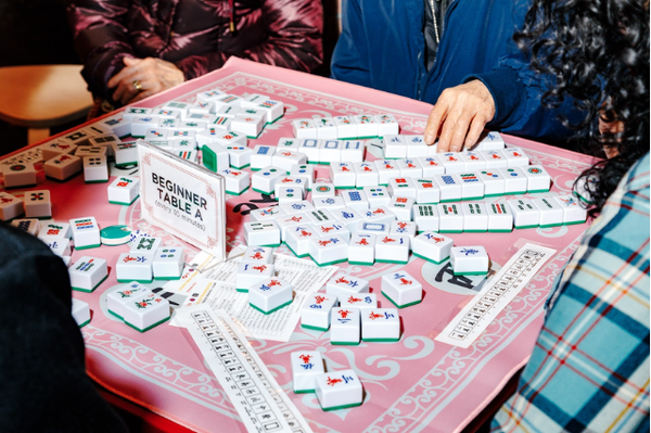 A mahjong game with players