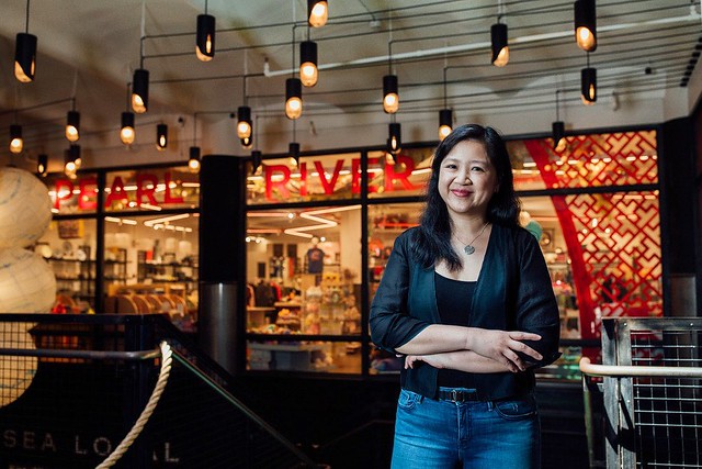 Pearl River President Joanne Kwong in front of Pearl River Mart at Chelsea Market