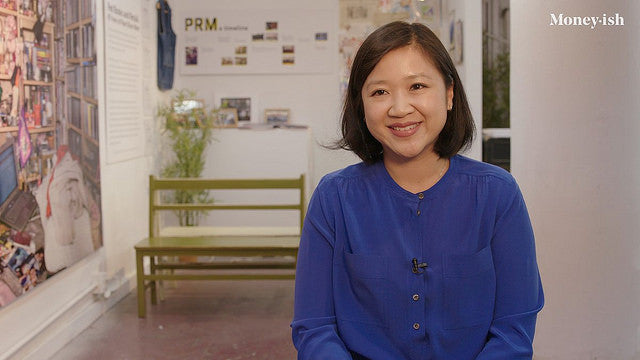Pearl River Mart President Joanne Kwong in blue blouse