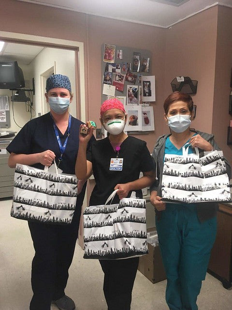 Nurses holding bags of Fatwitch brownies
