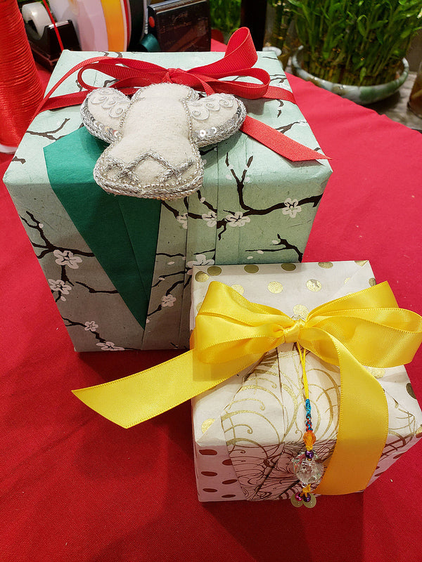 Boxes wrapped in the style of origata, the art of Japanese gift wrap