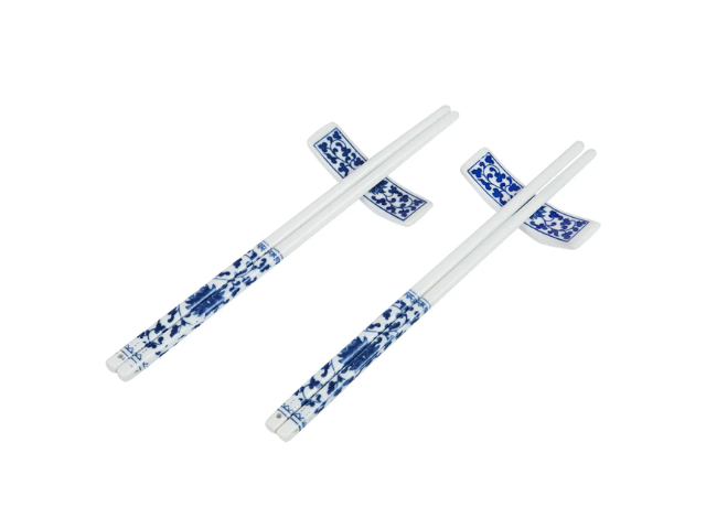 Two pairs of blue on white floral porcelain chopsticks on holders