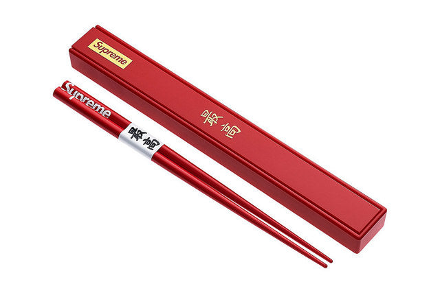 Red chopsticks with red box