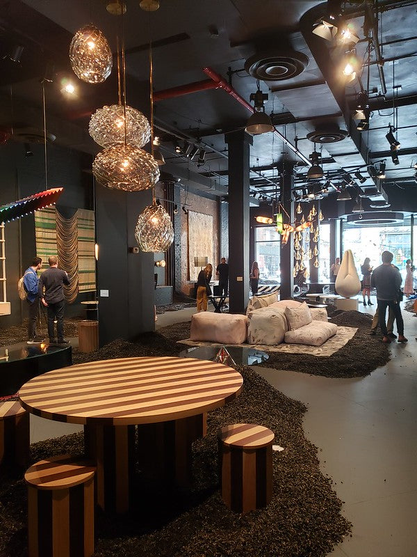 Pop-up gallery space of Next Level with modern furniture and lighting