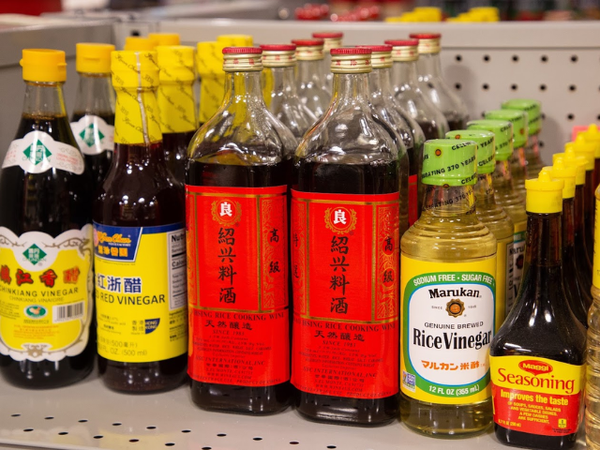 Various Chinese cooking ingredients on a shelf