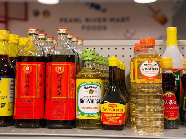 Various Chinese cooking ingredients on a shelf