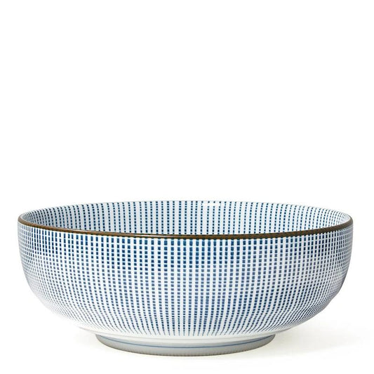 A wide ceramic bowl with a blue and white checkered grid pattern and a thin dark rim, shown against a plain white background.