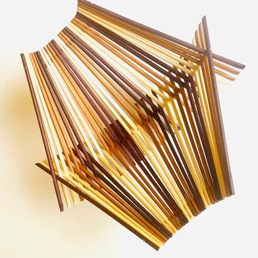 Folding basket made with 30 pairs of upcycled chopsticks alternating in three colors; Dark tea, Tea, and Natural