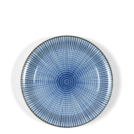 A round ceramic plate with a blue and white concentric geometric pattern, photographed from directly above on a white background.