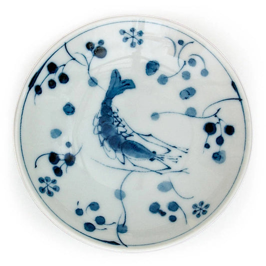 A round white ceramic plate with a blue hand-painted shrimp and floral design, shown from a top-down view on a white background.
