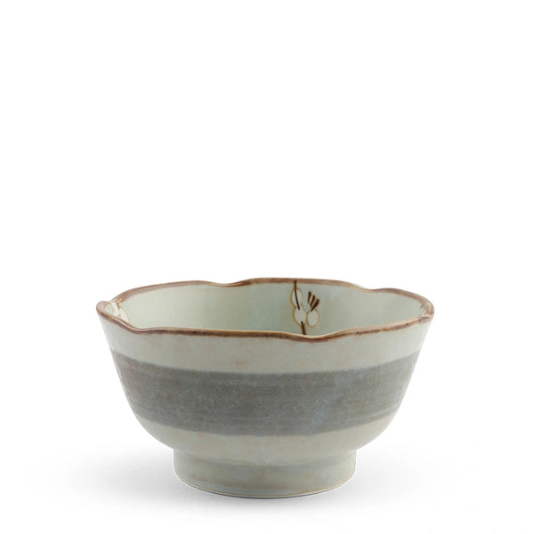 A ceramic bowl with a scalloped rim, featuring a light green glazed interior, a textured gray-blue band around the middle, and a rustic brown edge.