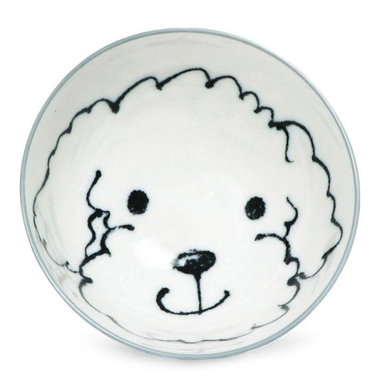 A white bowl with a black outline drawing of a fluffy dog's face on the inside. The design is cute and simple, exuding a playful and cheerful vibe.
