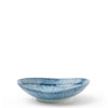 A blue and white striped ceramic bowl with a ribbed exterior, shown on a plain white background.