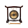 Gong on a stand with a mallet on a white background