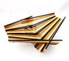 Folding basket made with 30 pairs of upcycled chopsticks alternating in three colors; Black, Tea Stained, and Natural
