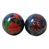 Two blue balls with peony flower designs on a white background