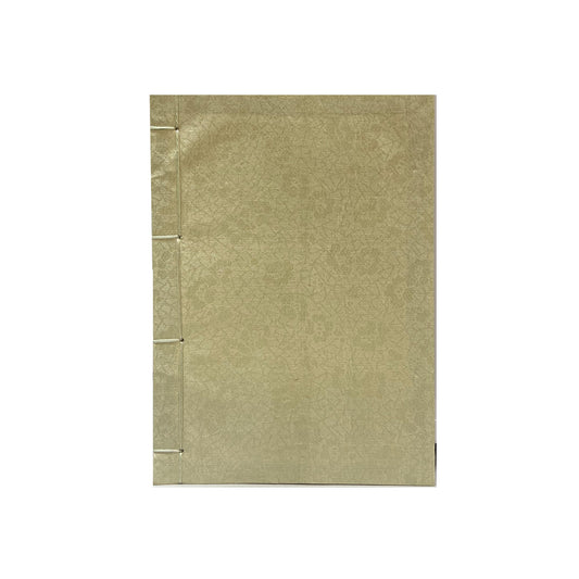 Beige notebook on a white background
