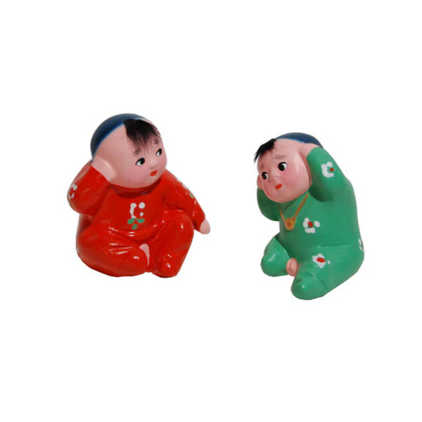 Hand Painted Clay Figurine. Hearing Firecrackers