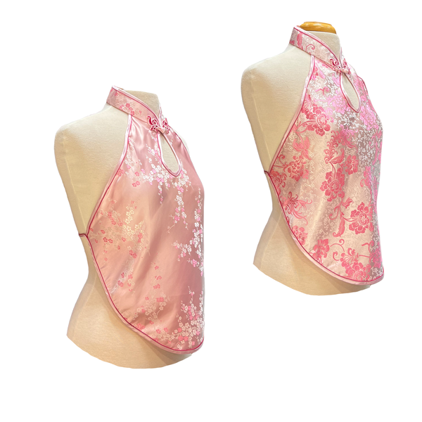 Two pink halter tops on mannequins