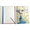 Notebook with a snowy landscape illustration on the cover