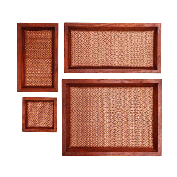 Four wooden trays in various sizes